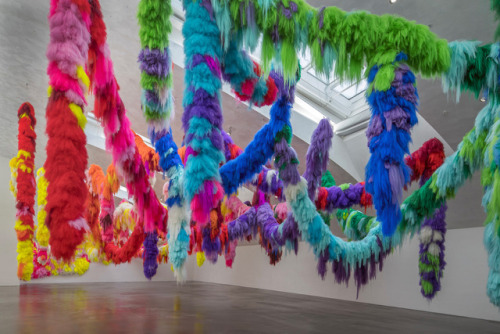 itscolossal:Textural Installations by Shoplifter Immerse Visitors in Furry Neon Caves