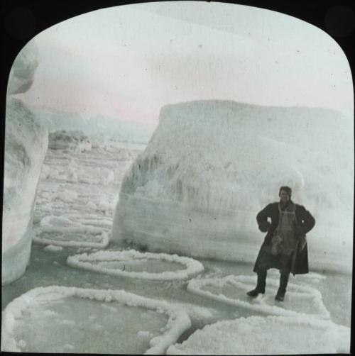 How to look stylish on a pancake. Man on pancake ice. British Antarctic Expedition c.1910   Taken by