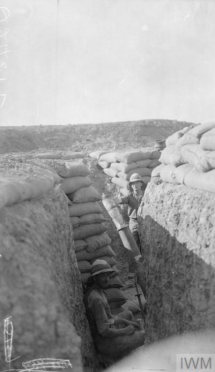 scrapironflotilla: Loading and firing a 6 Inch Newton mortar from a trench somewhere in Mesopotamia,