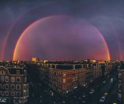 sixpenceee:  This magnificent rainbow was spotted in Amsterdam. (Source) 