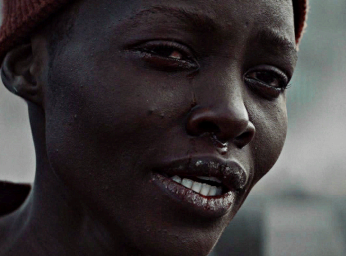 LUPITA NYONG'O As SAM (featuring Some Frodo)A QUIET PLACE: DAY ONE (2024) Dir. Michael Sarnoski