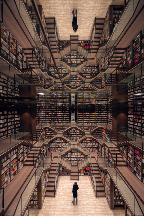 itscolossal:  Mirrored Ceilings and Criss-Crossed Stairwells Give a Chinese Bookstore the Feeling of an M.C. Escher Woodcut