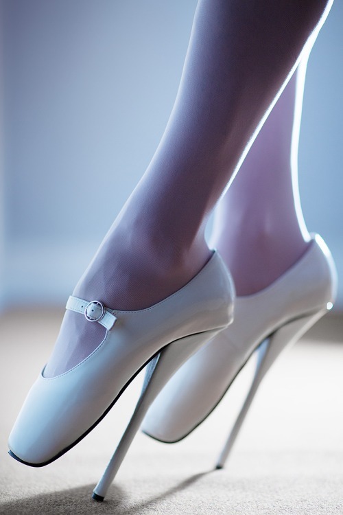 modern-air-travel:  kassendra69:       It’s been a while since I’ve posted about ballet heels. Normally, I strongly prefer ankle boots, but for some reason I like this photo set of white Mary Jane style shoes. I look forward to the very twisted wedding