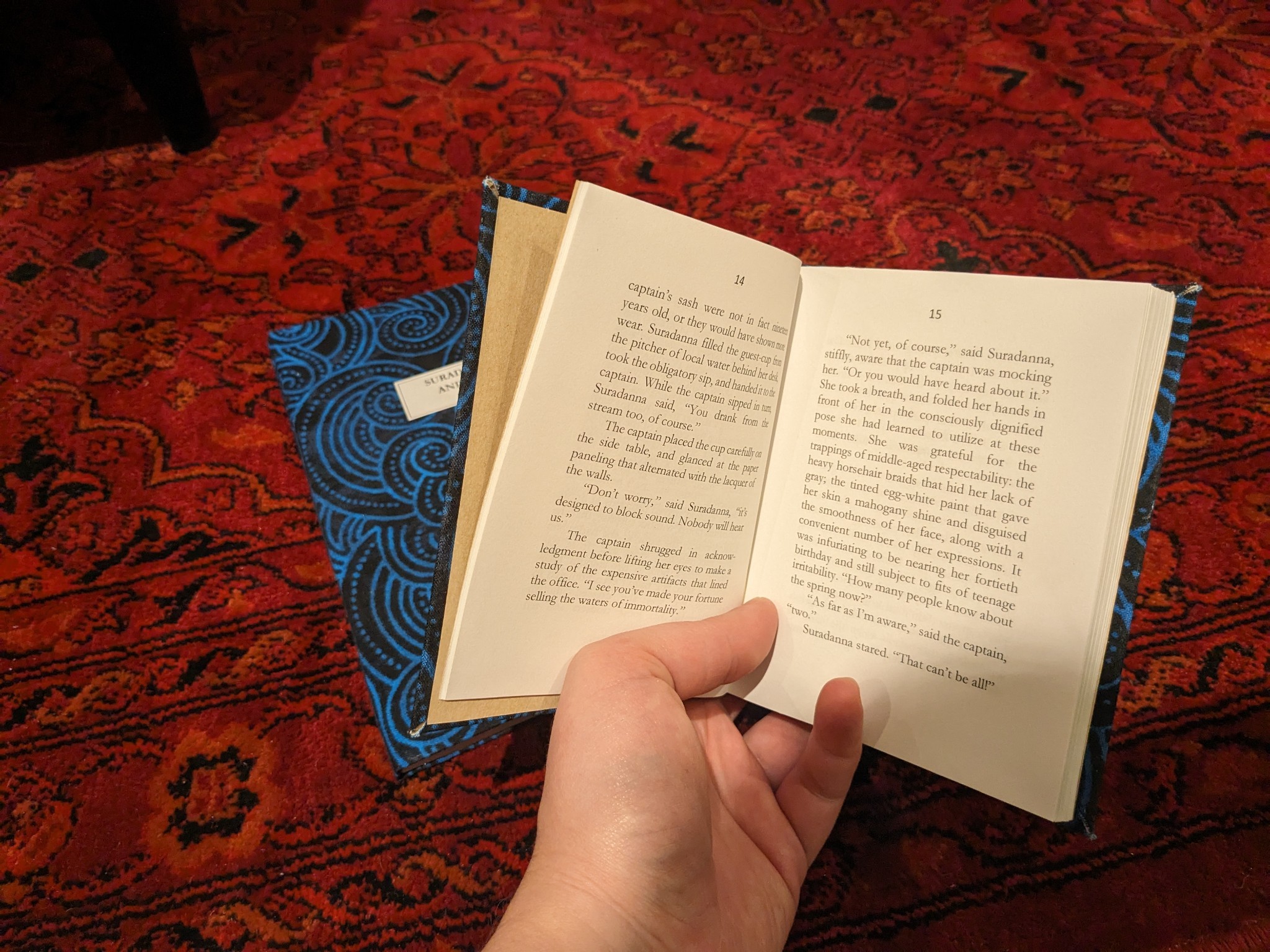 photo of the interior of the quarto edition of a hand-bound book