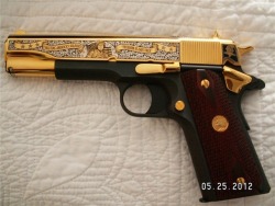 weaponslover:   Gold Colt .45  