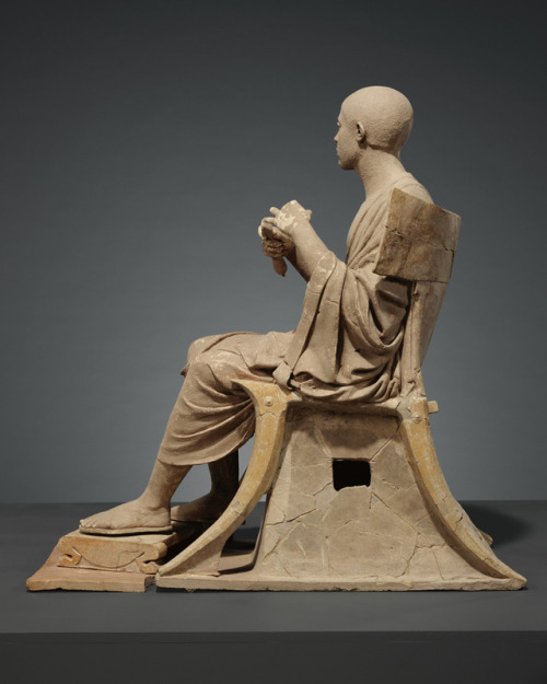 Statue of a seated poet (Orpheus?)Greek (from Tarentum), Early Hellenistic Period, 330-300 B.C.terra