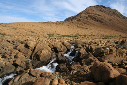 yehlsays:Tablelands, Gros Mourne National Park, Newfoundland.  That reddish rock is called peridotit