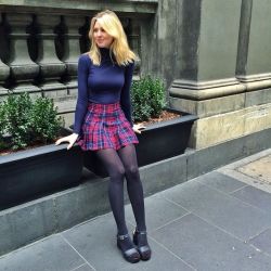 pleatedminiskirts:  Just love her style.