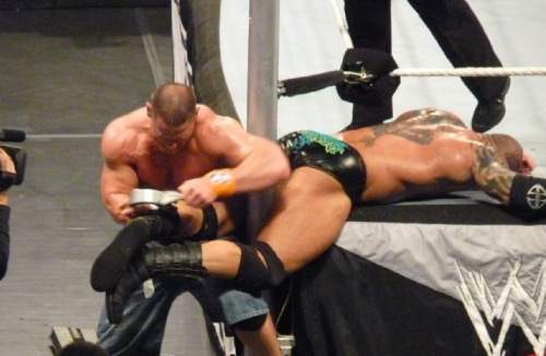 rwfan11:   Batista being tied up by Cena  A bit kinky aren’t we John! ;)