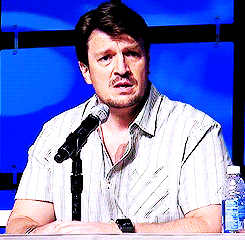adeles:  Nathan Fillion reacts to the baby crying in the background while answering
