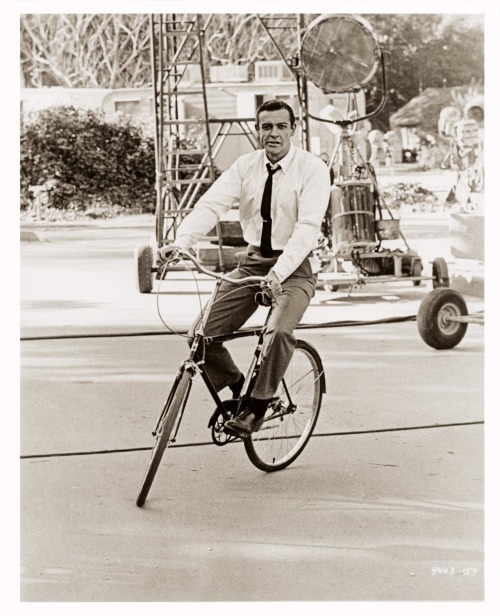 putthison:Lower Your Tie ClipI like this photograph of Sean Connery on a bicycle for a lot of reason