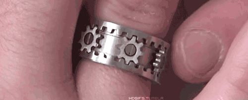 wolf-and-kitten:  awesomeshityoucanbuy:   Kinekt Gear Ring – Jewelry For Fidgeters!  The Kinekt Gear Ring finally gives you a real excuse to incessantly rotate your ring. Featuring six micro-precision gears that turn together as you spin the outer rims,