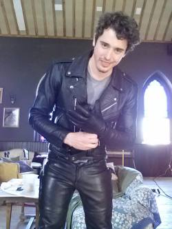 punkerskinhead:  he is enjoying himself while wearing leather. 