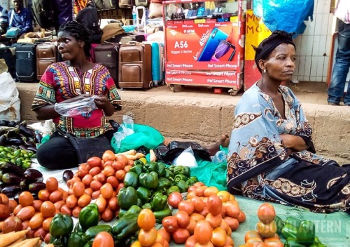 “The streets living normally ” With in the city centre of Kampala. Street vendor.©JOSH