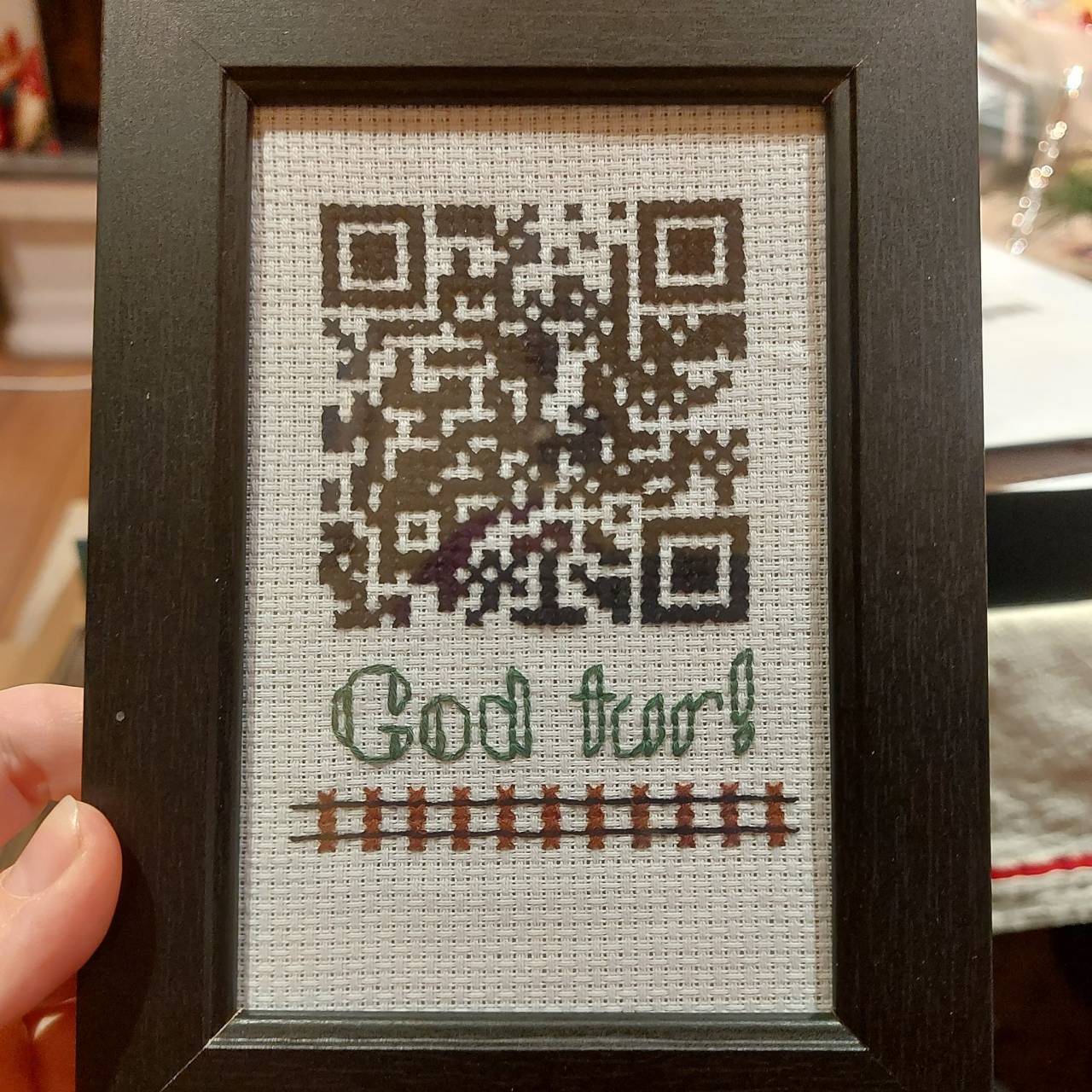 Why you should absolutely cross-stitch a QR code