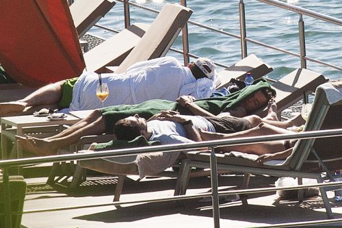 onedhqcentral-blog: Harry at the hotel pool in Como (30.06.2014) - x