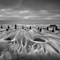 stephenmcnallyphotography:  Sea washing up the beach Swish white trails recede Rolling stones and pebbles 