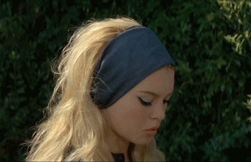 bardotinmotion:  Brigitte Bardot in Le Mepris. Now that’s how you wear a head-band!