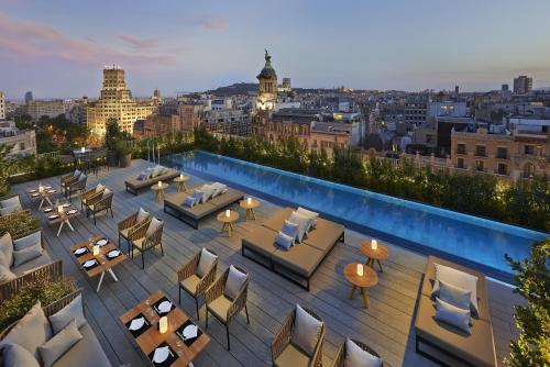forbes-life:  8 Outrageously Gorgeous Hotel PoolsFloating in any body of water is pretty dreamy, but today’s hospitality  designers have found more and more ways to elevate the humble hotel  swimming pool into a spectacular work of art. The most beautiful