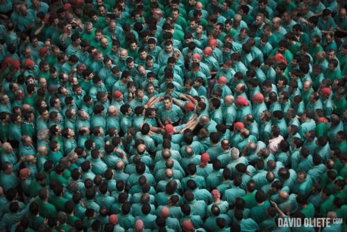 photojojo:  The mind-boggling images above were captured by David Oliete at the 2012 Human Tower Competition held in Tarragona, Spain.  Out of context, they’re kind of mysterious and moving, right? The 2012 Human Tower Competition Yields Intriguing