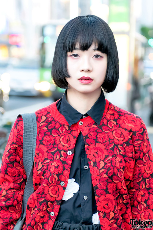 18-year-old Moenon on the street in Harajuku wearing layered tops from Comme Des Garcons with a Yohj