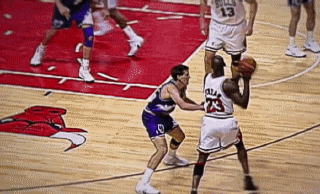  Michael Jordan with the ridiculous finish while taking the hard foul from Greg Ostertag