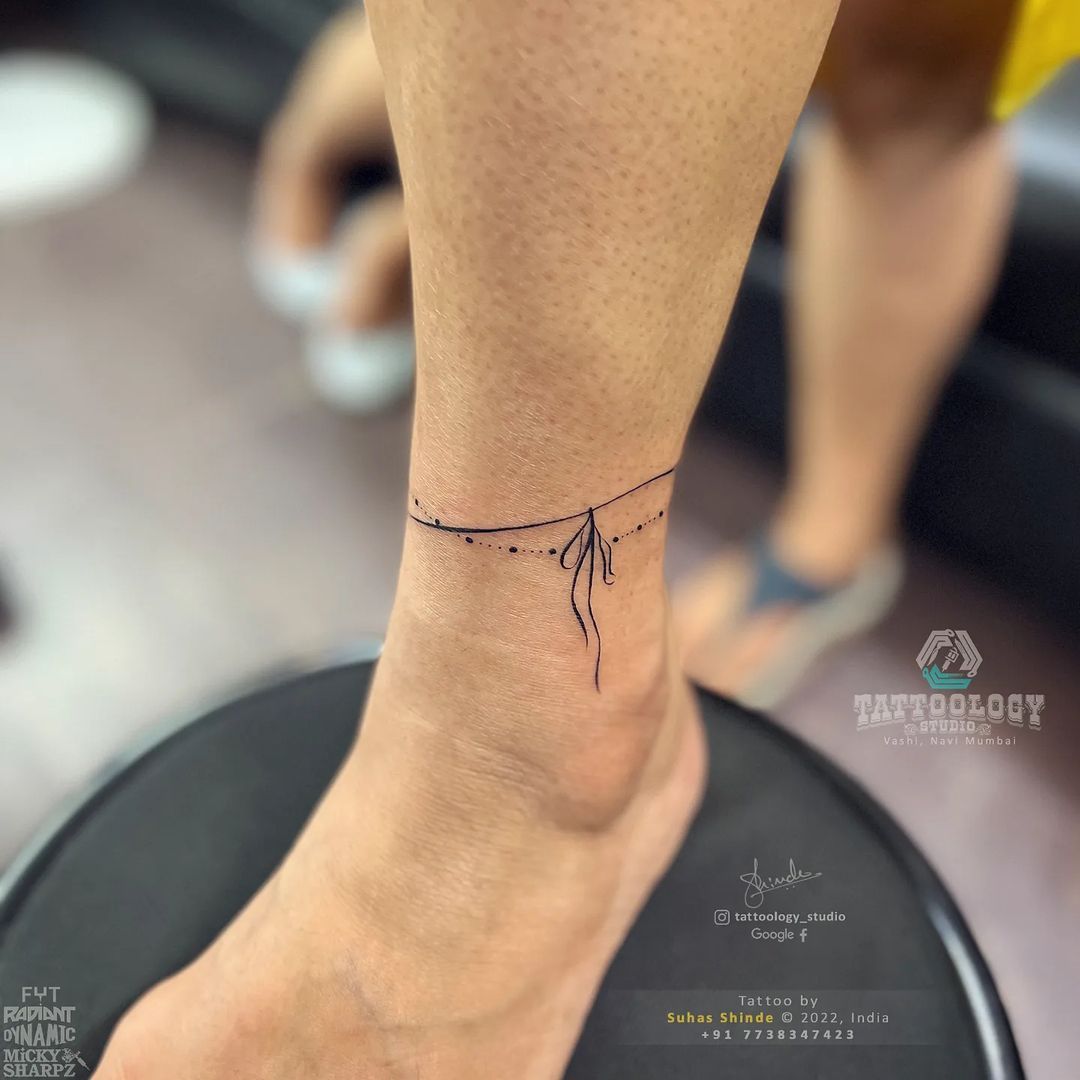 Small flower tattoo on the left ankle. Tattoo... - Tattoofilter USA for Men  and Women