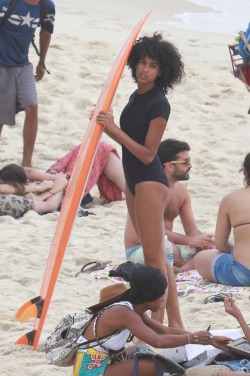 glitterdixk:  imaanhammamofficial:  January 5: Imaan Hammam is spotted at the beach in Brazil.  She’s literally always serving face and body. Like how are you doing that holding a damn surfboard?! TELL ME HOW!! 