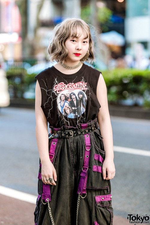 Japanese students 15-year-old Yui and 17-year-old Lisa on the street in Harajuku. Yui is wearing an 