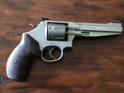 badger-actual:  Smith & Wesson Pro Series 986, 9mm.