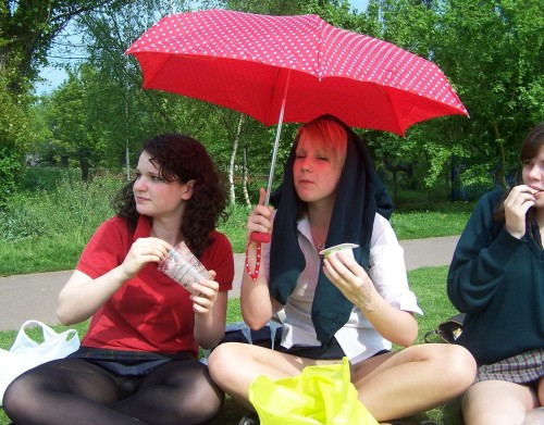 Nice view of a girl in black pantyhose having lunch.Woman in pantyhose