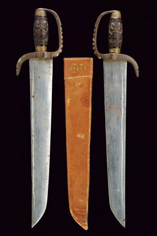 A pair of hudiedao short swords, China, circa 1900.from Czerny’s International Auction House