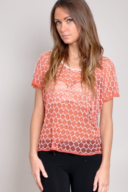 TFNC embellished cap sleeve sheer top. Perfect with leggings. Care: 100% Polyester; Cool Hand Wash M