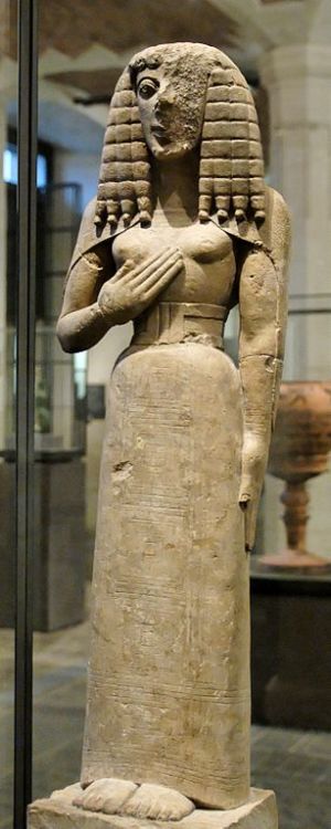 So-called Lady of Auxerre, a female statuette in the Daedalic style. Limestone with incised decorati