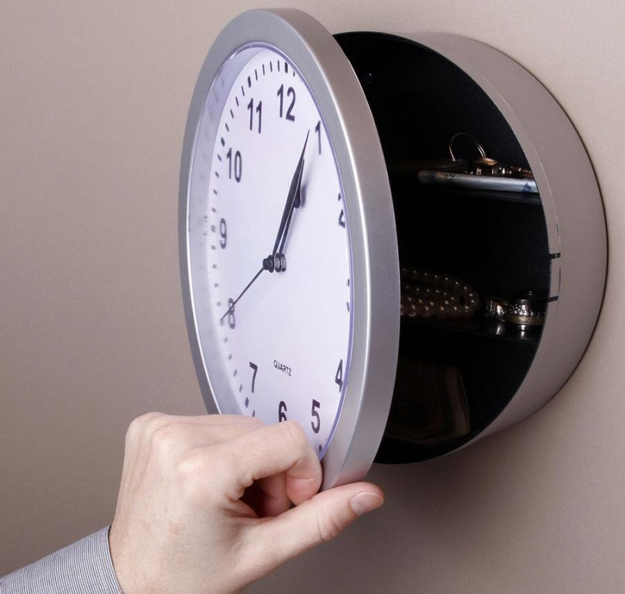 odditymall:    This clock has a hidden safe behind it where you can store all your