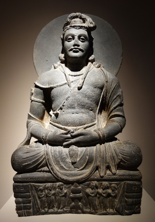 Sculpture of the seated Maitreya (the future Buddha).  Artist unknown; 2nd/3rd cent. CE. From I