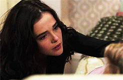 :  I tightened my grip on her arm, digging my nails in to get her attention. She flinched.