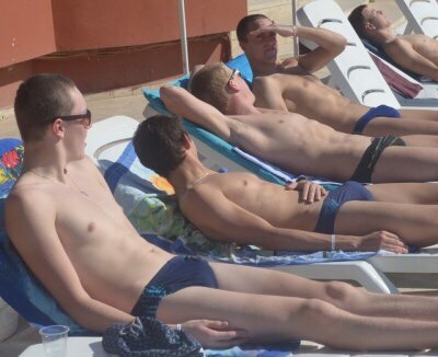 speedomatt:  Swim team getting some sun between practices over spring break Coach