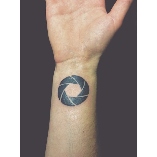 Capture Life's Moments with a Stunning Camera Aperture Tattoo