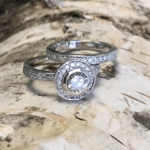 Created this wonderful diamond halo wedding set recently. The...