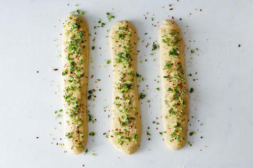 Porn photo food52:A scallion pancake and a loaf of challah