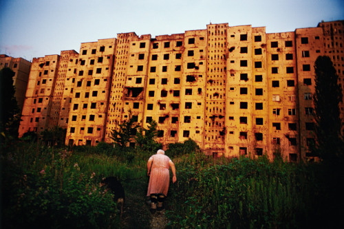 unearthedviews:GEORGIA. Abkhazia. Sukhum. 2005. Babushka “Tanya,” an elderly Russian woman, heads ba