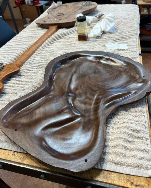 Working on the inside of the next M-tone. Beauty throughout! #handmadeguitars #sculpture #boutiquegu