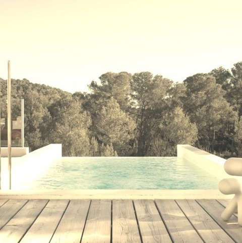 Montpellier PoolMid-sized Contemporary Rectangular Infinity Pool Design For The Backyard With Decking