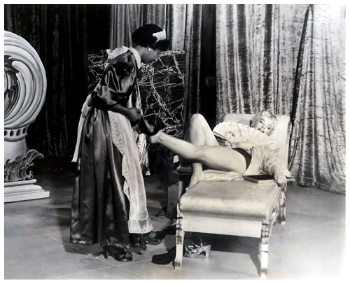 Lili St. Cyr        (aka. Marie Van Schaack)   Appears in a publicity still for the 1950s Burlesque film: “Love Moods”.. The film was shot on the stage of the ‘FOLLIES Theatre’; located in downtown Los Angeles..
