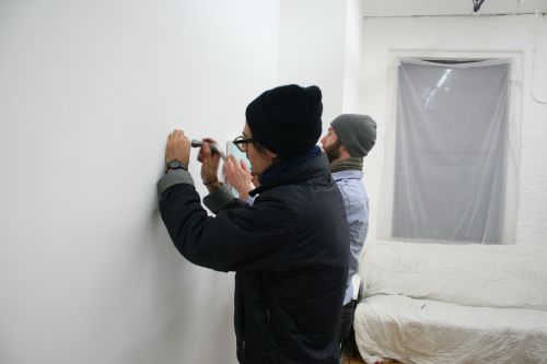 The Associated team and artist Jacob Cartwright transitioning the gallery from Weeknights, and prepa