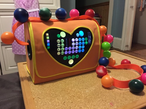 theprospitprincess:  skunkandburningtires:  Couldn’t find Big Hero 6 toys, so I build my daughter her own Honey Lemon purse.” –  blee456  HOW THE FUCK.