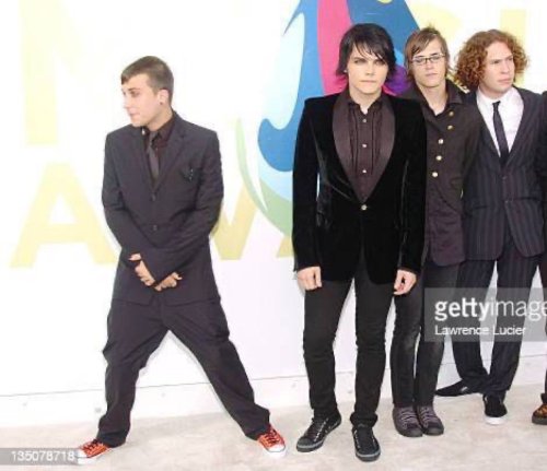 Theres So Much Wrong With This Picture Like Why Is He Posing Like That??? Why Cant He Be Normal ?? Also
