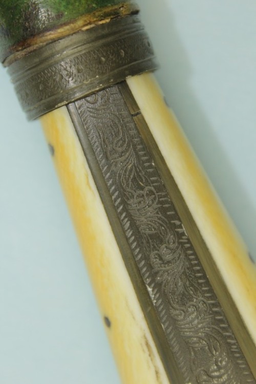 we-are-rogue:    Ottoman dagger, Crete, 19th century   This fine knife measures just under 27.5cms long in its sheath and 25cms  long out.  Its blade length is 15.5cms including the bolster.The  grip slabs are Elephant ivory pinned in 6 places to each