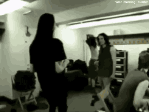 coma-morning:  Marilyn Manson & Trent Reznor high-fiving.Because why not?  The beautiful people in the beautiful days of friendship.